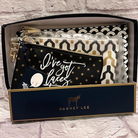 Dabney Lee Handbags - accessories set of three pouches travel “ I’ve got places to go”